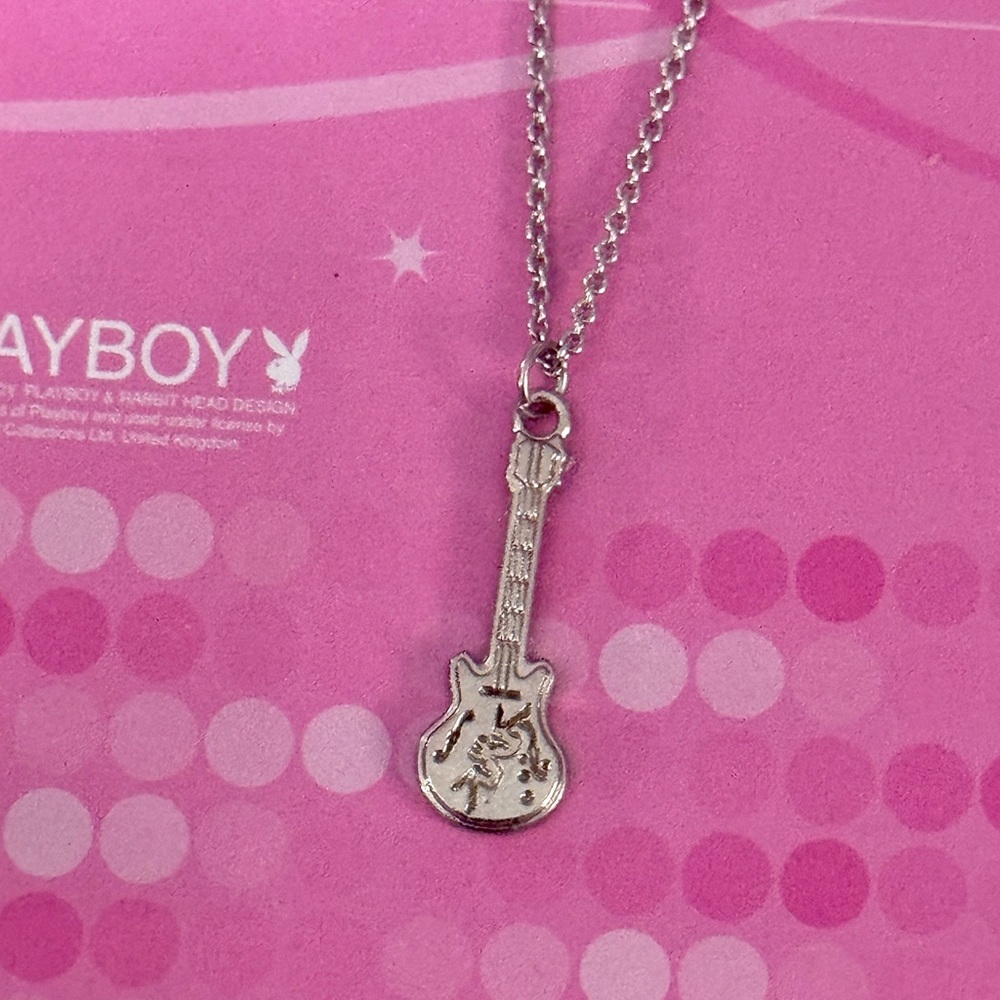 Playboy guitar necklace